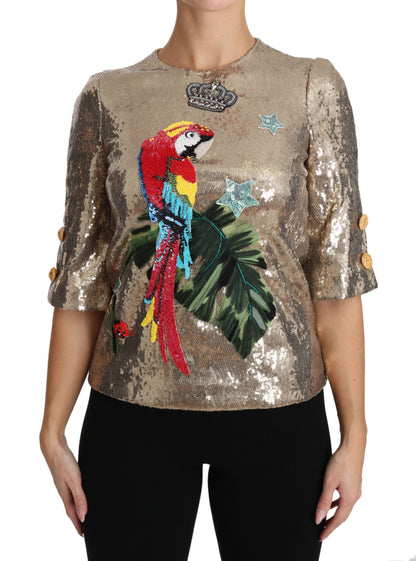 Dolce &amp; Gabbana Blusa dorada con cuello redondo y estampado de loros con cristales