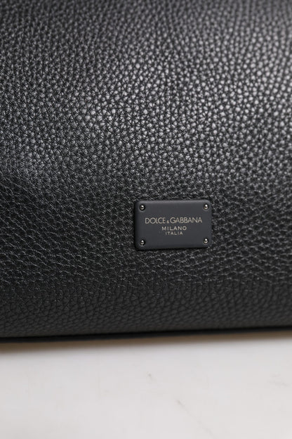 Bolso bandolera de piel negra con placa del logotipo de Dolce &amp; Gabbana