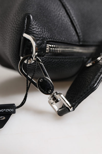Bolso bandolera de piel negra con placa del logotipo de Dolce &amp; Gabbana