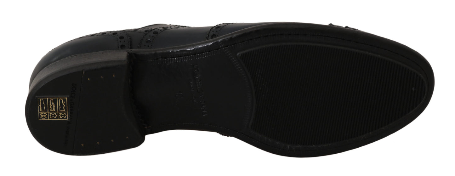 Dolce &amp; Gabbana Elegantes zapatos Derby con punta de ala de cuero azul
