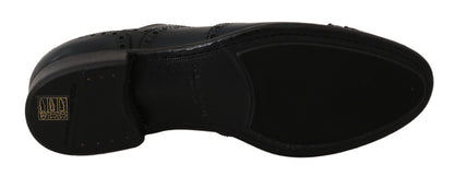 Dolce &amp; Gabbana Elegantes zapatos Derby con punta de ala de cuero azul