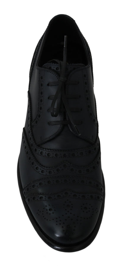 Dolce &amp; Gabbana Elegantes zapatos Derby con punta de ala de cuero azul