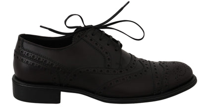 Dolce &amp; Gabbana Elegantes zapatos de vestir Derby con punta de ala en color burdeos
