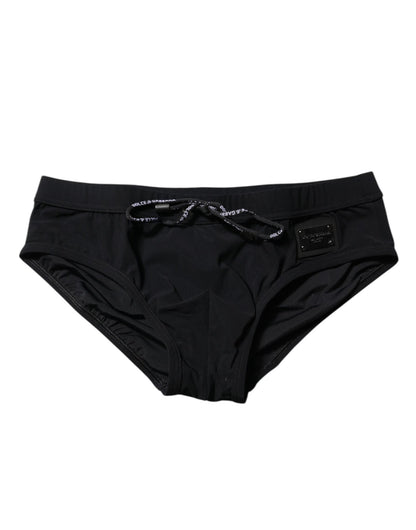 Dolce & Gabbana Black Logo Plaque Men Beachwear Brief Swimwear – IT4 | S par Dolce & Gabbana | Disponible sur Sandy Store ByNet
