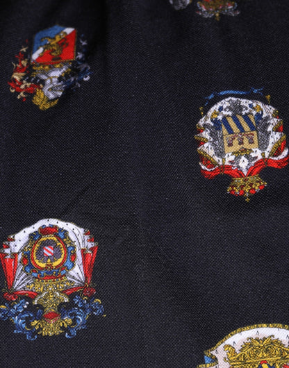 Dolce & Gabbana Blue Heraldic Crest Print Polo Shirt T-shirt – IT52 | XL par Dolce & Gabbana | Disponible sur Sandy Store ByNet