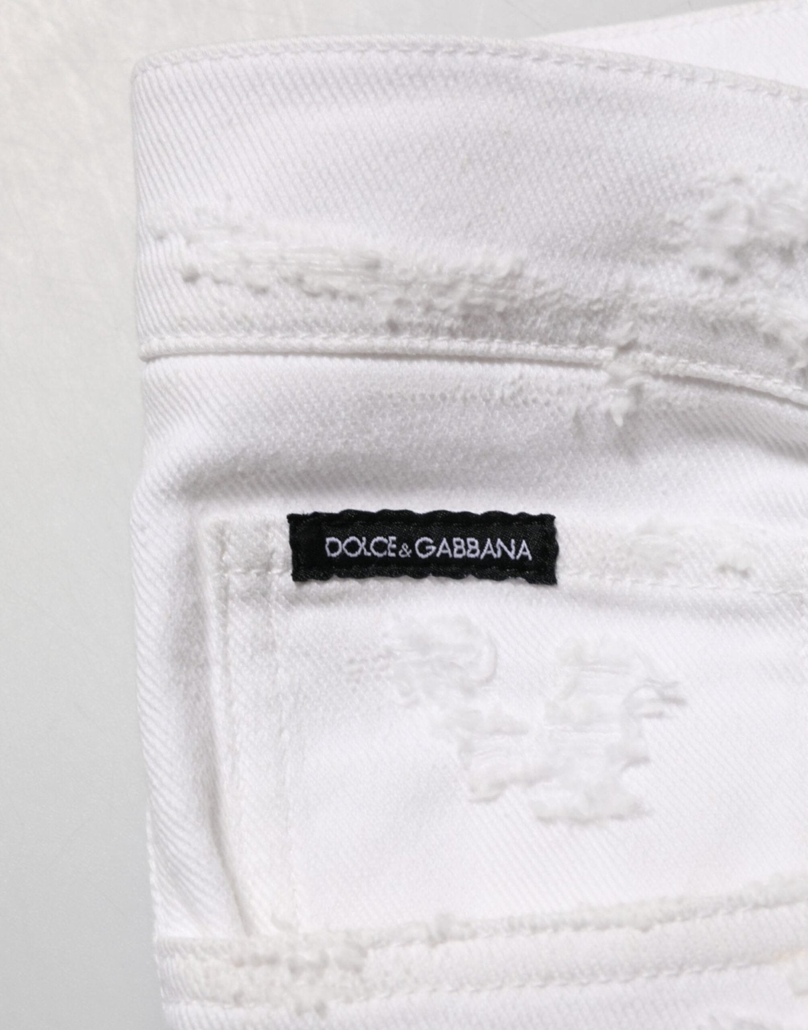 Dolce & Gabbana White Distressed Ripped Denim Trouser Jeans – IT48 | M par Dolce & Gabbana | Disponible sur Sandy Store ByNet